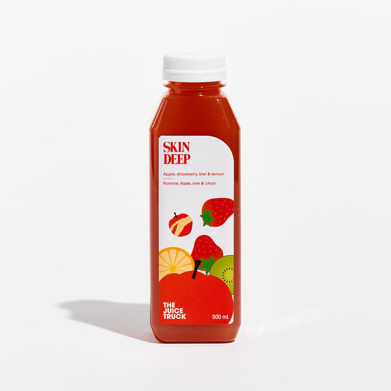 A bottle of juice labeled 'SKIN DEEP' with illustrations of a strawberry, kiwi, apple, and lemon on the label.